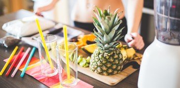 Girl Preparing Healthy Fruit Milkshake