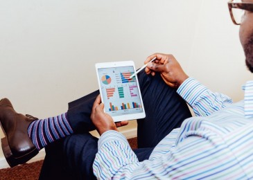 Man Working on a Tablet